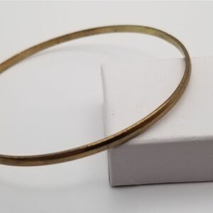Copper tone bracelet slider. B709